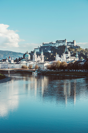 Salzburgs old city with fortress Hohensalzburg, blue sky