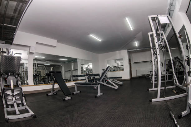 istock Fish-eye effect on modern and light gym equipment 1151944615
