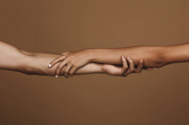 istock Couple tenderly holding hands 1151951899