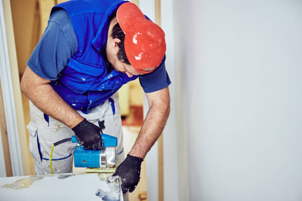 istock Handyman fixing / working on a house renovation. 1151951948