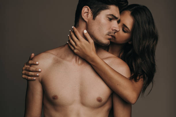 loving young couple - sensuality men shirtless studio shot imagens e fotografias de stock