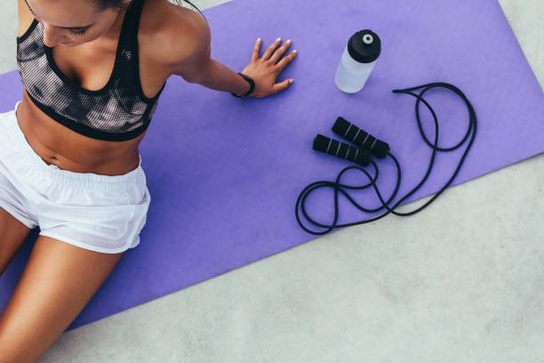 istock Sportswoman resting after physical training 1151952455
