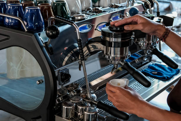istock Coffee machine in cafe. Barista Cafe Making Coffee Preparation Service 1151953122