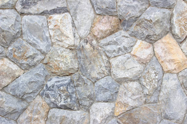 istock Background texture of Medieval natural stone wall textured background. 1151958279
