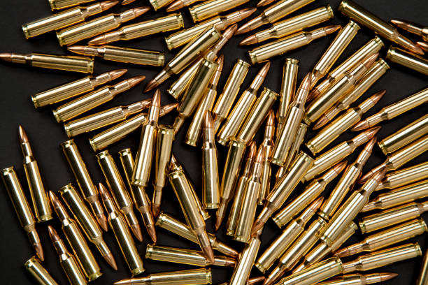 istock Rifle cartridges on a black background 1151958408