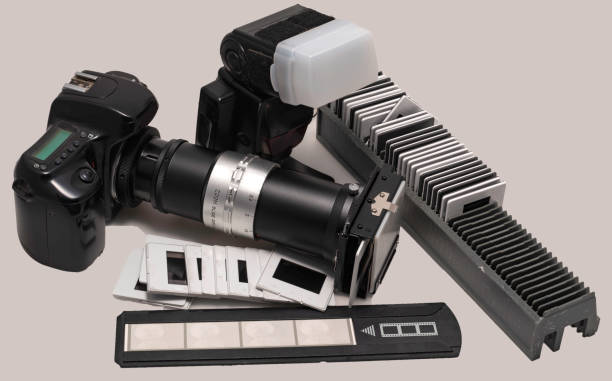 istock Scan slides with DSLR and zoom slide duplicator to transform into digital data 1151959334