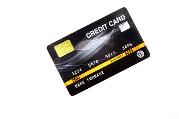 Black bank credit card on white background