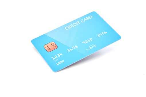 Blank bright blue credit card isolated on white background