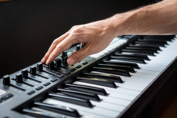istock MIDI keyboard synthesizer piano keys closeup for electronic music production 1151966151