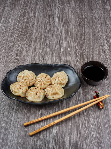 istock Korean steamed dumplings snack with soy sauce 1151966371