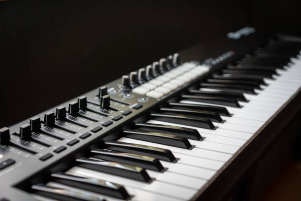 istock MIDI keyboard synthesizer piano keys closeup for electronic music production 1151966800