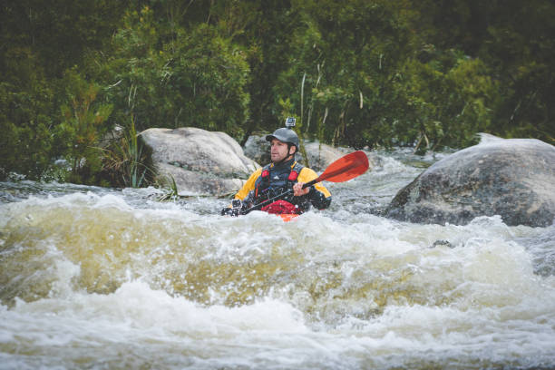istock Close up image of a white water kayaker. 1151974698