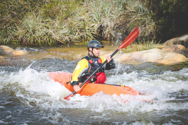 istock Close up image of a white water kayaker. 1151974707