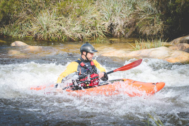 istock Close up image of a white water kayaker. 1151974779