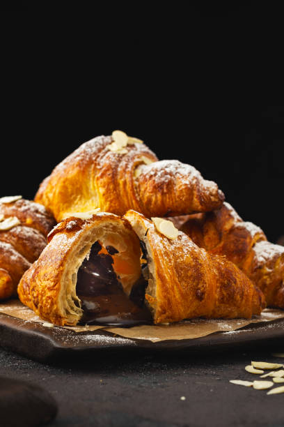 istock Freshly baked croissant with chocolate 1151978296