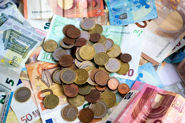 istock stack of euro banknotes and coins of different denominations 1151979771