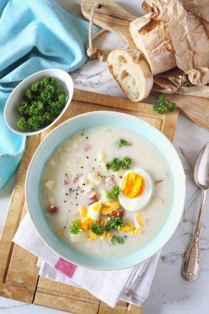 istock Zurek. Sour soup with sausage,  potatoes and eggs 1151979797