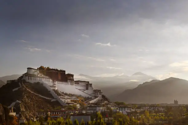 The Potala Palace in Lhasa at dawn set against Himalayan mountains. Tibet
The historic residence of the Dalai Lama of Tibet, constructed from 1645 - now a museum that dominates the skyline of Lhasa