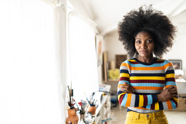 istock Female artist in studio 1151982229