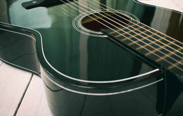 istock acoustic guitar on the table 1151984260