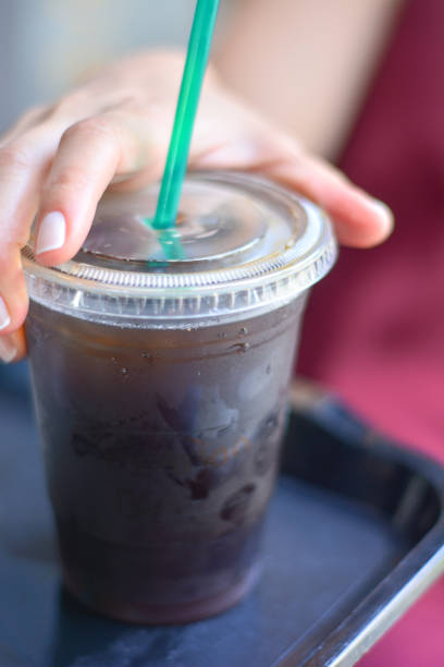 istock Woman Holding an Ice Coffee Plastic Glass 1151988721