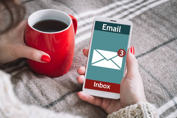 istock The woman received an e-mail online on a mobile. Message online icon. 1151996271