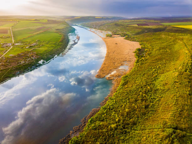 istock Flight over the river and forest at spring time. Dniester river of Moldova republic. 1151996868