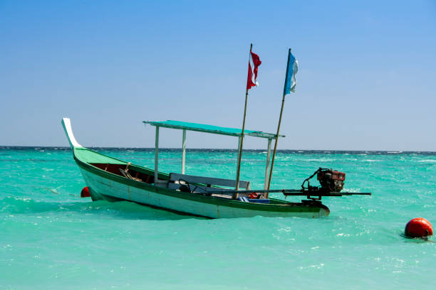 Thai diving boat in a clear blue sea stock photo