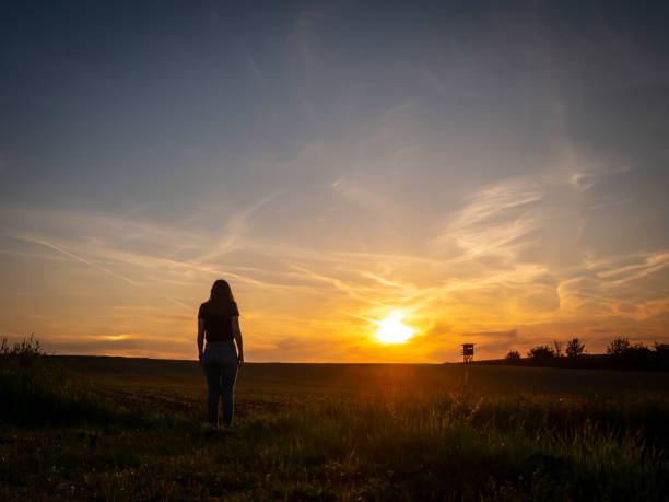 istock Young woman in the sunset 1152000117