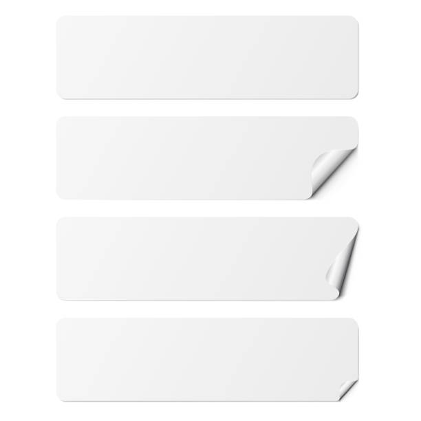 Set of white rectangle adhesive stickers with a folded edges, isolated on white background. Set of white rectangle adhesive stickers with a folded edges, isolated on white background. blank sticker stock illustrations