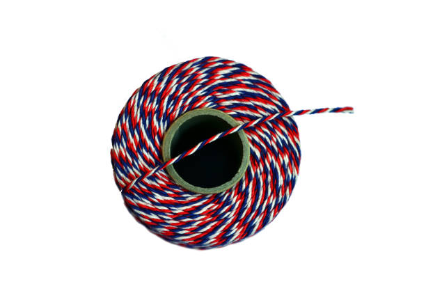 istock Spool of colorful thread close up 1152001391