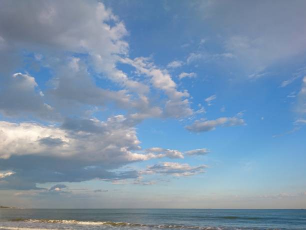 istock Bright blue sea and white clouds on the beach 1152004821