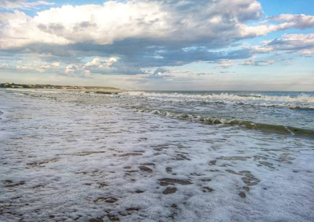 istock Bright blue sea and white clouds on the beach 1152004853