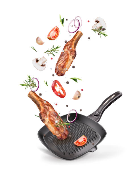 istock Meat steak in a pan with vegetables, pepper and salt.jpg 1152010454