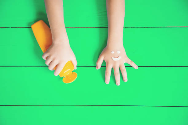 istock Sunscreen on the hand of a child. Selective focus. 1152012190