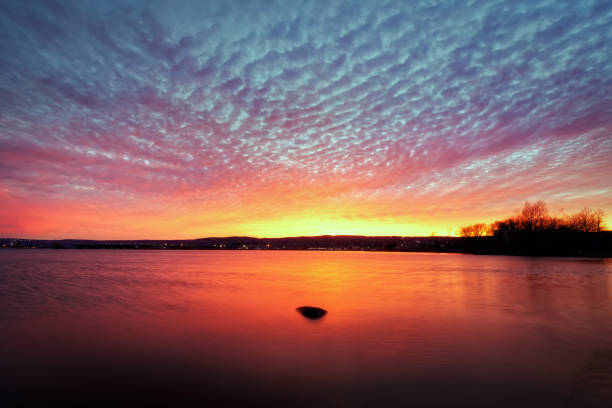 Beautiful fish scale sunset clouds over St Louis River Duluth Minnesota