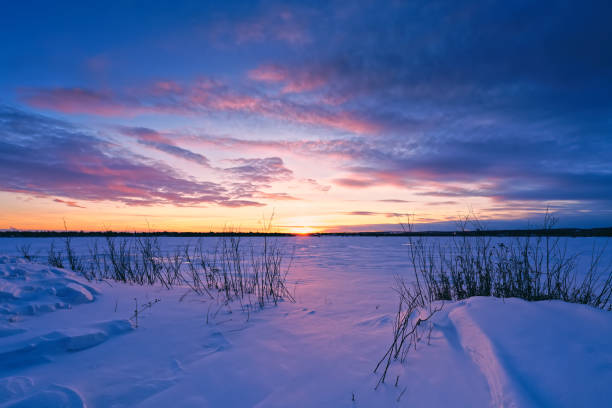 Winter ice and snow over Lake Superior during sunset