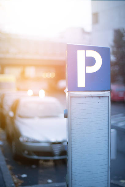 istock Parking in midtown: parking machine, morning scenery and cars. Sunlight. 1152020756