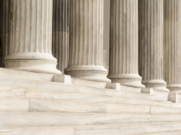 Architectural detail of marble steps and ionic order columns