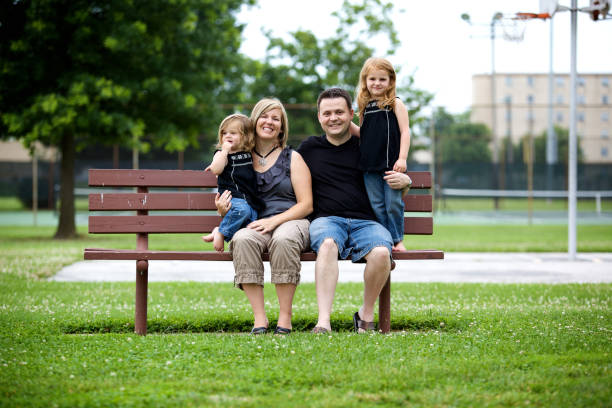 istock summer young nuclear family outdoors 115202101