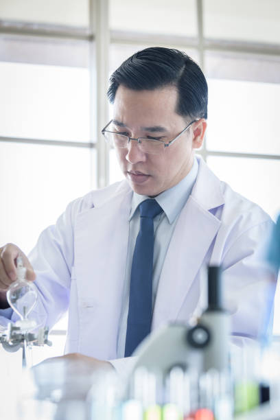 istock Asian senior scientist researching and learning in a laboratory. 1152021626