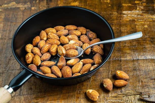 istock Healthy almonds in a bowl on a wooden table 1152021704