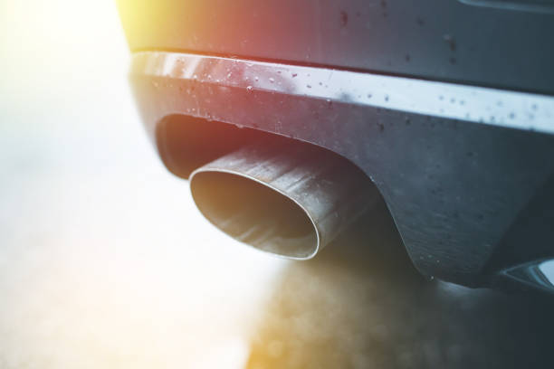 istock Powerful car with exhaust pipe, pollution and fine dust 1152021917