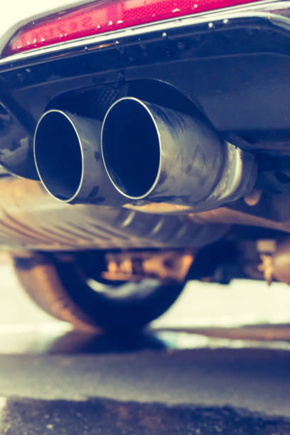 istock Powerful car with exhaust pipe, pollution and fine dust 1152022459