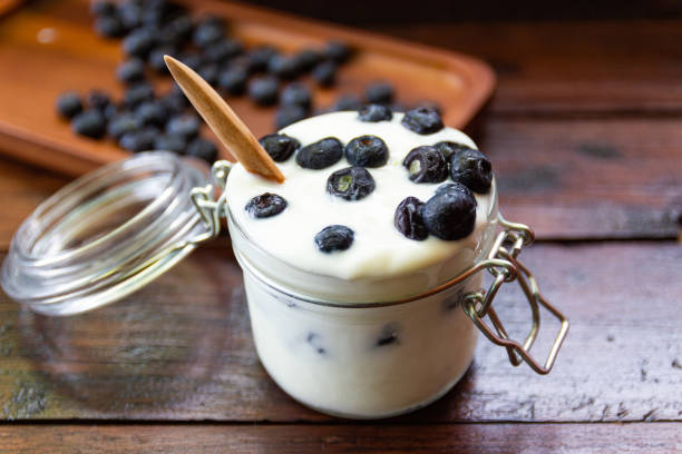istock Blueberries in fresh organic yogurt in glass 1152022471