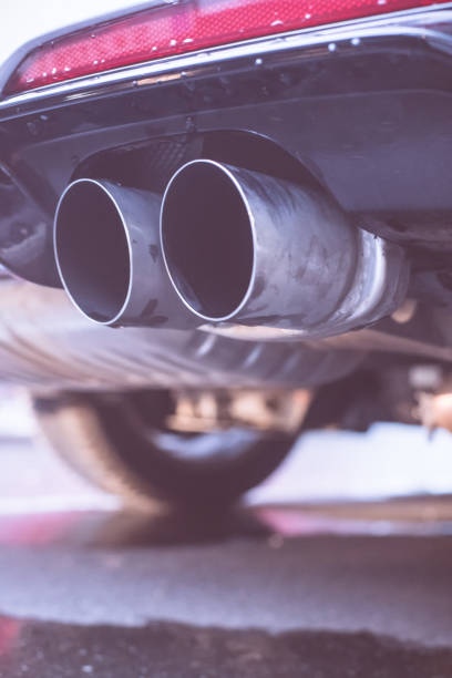 istock Powerful car with exhaust pipe, pollution and fine dust 1152022516