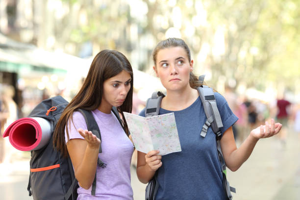 istock Two lost backpackers trying to find location 1152023742