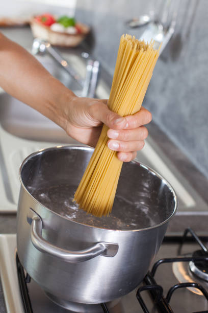 istock cook pasta in hot water 1152025213