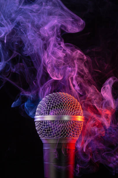 istock mike and smoke on black background 1152027871