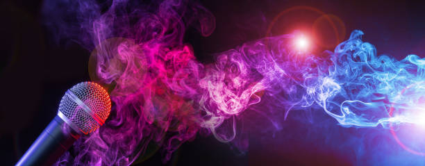 istock microphone in smoky stage background 1152027932